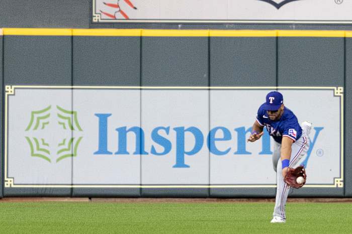 Sep 6, 2022; Houston, Texas, USA; Texas Rangers center fielder Leody Taveras (3) fields Houston Astros third baseman Alex Bregman (2)(not pictured) single in the fifth inning at Minute Maid Park. Mandatory Credit: Thomas Shea-USA TODAY Sports